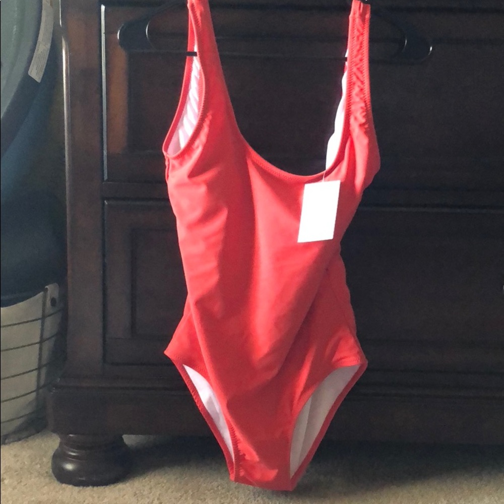 Solid red one piece swim suit